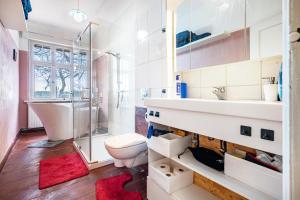 a bathroom with a sink toilet and a shower at Villa Seeblick in Rheinsberg +27 photos