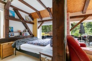 a bedroom with a bed and a window at Wohnung am Stadtrand im Grünen in Zeuthen