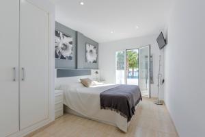 เตียงในห้องที่ Zahories Córner Mojácar sea views +18 ภาพ