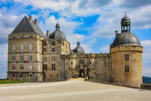 an old castle with two domes on top of it at Le haut Picot in Bussac +16 photos