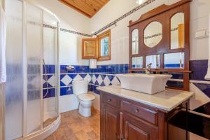 a bathroom with a sink and a shower at Deltaprego in Deltebre +32 photos
