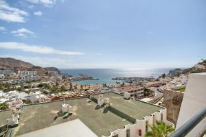 a view of the ocean from a building at Casa Boti in Puerto Rico de Gran Canaria