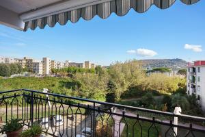 a balcony with a view of a city at Casa Isabea in Pozzuoli