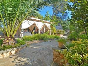 a view of a house with trees and plants at Benestar in El Toro