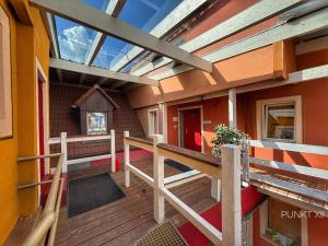 a balcony of a building with a skylight at Wohnung 3 in Burghaslach