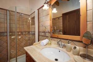 a bathroom with a sink and a shower at Son Soler - Can Torres in Islas Baleares +21 photos