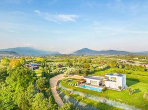 an aerial view of a house with a swimming pool at Villa Angelina in Lazise