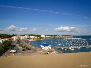 an aerial view of a marina with boats in the water at Chambres Espace Rennaissance in Chantonnay