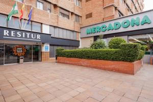 a store front of a merroco headquarters at Triana Historic Center in Seville