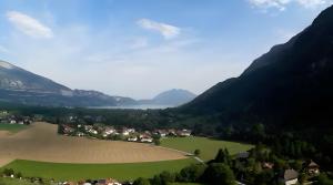an aerial view of a village in the mountains at La Grange in Doussard +12 photos