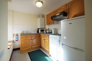 Kuchyň nebo kuchyňský kout v ubytování Ty Uchaf + 2 fotografie