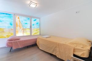 a bedroom with a bed and a window at Water Run in Bari +19 photos