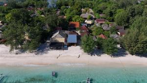 an aerial view of a house on a beach at Yaya BCB in Gili Meno