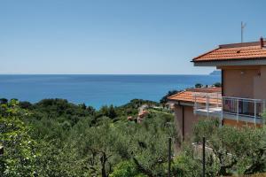 a view of the ocean from a house at Lemon Green in Celle Ligure