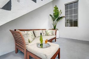 a living room with a couch and a table at Vista Alegre 22 A in El Paso