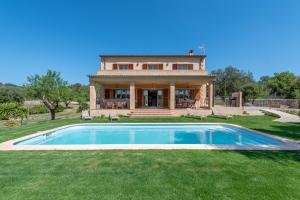 a house with a swimming pool in the yard at Son Forte Nou in Artá