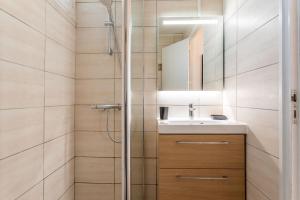 a bathroom with a sink and a shower at Villa de la brune in Bormes-les-Mimosas +13 photos