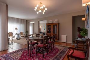 a dining room with a table and chairs at Afife Sea and Mountain Retreat in Afife