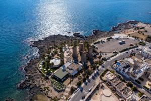 an aerial view of a resort near the ocean at Casa Ninì in Galatone