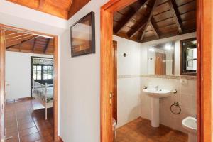 a bathroom with a sink and a toilet at El Morro in Tijarafe +17 photos