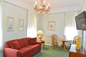 Χώρος καθιστικού στο Penn Wells Hotel