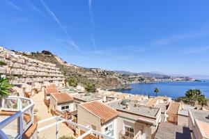 a view of the amalfi coast from a balcony at Las Lomas de Marina del Este in Almuñécar
