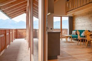 a house with a view of the mountains at Peintnerhof Percha in Perca