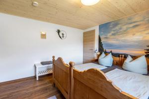 Llit o llits en una habitació de Mühlen Chalet