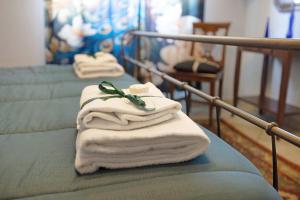 a group of towels sitting on top of a table at Locanda Casa Bardacchino in Mango +110 photos