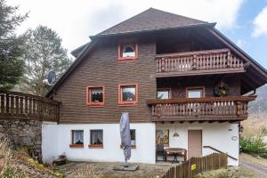 a large house with a balcony on top of it at Haus Maria in Todtnau