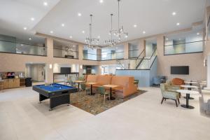a large room with a ping pong table in it at Hampton Inn & Suites by Hilton San Diego SeaWorld Near Old Town in San Diego