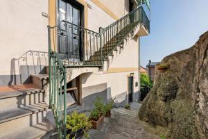 a staircase leading up to a building with a balcony at Luca Via Gavazzo 18 in Bonassola