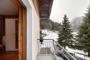 a balcony with a view of a snow covered mountain at La Maisonnette in Valtournenche