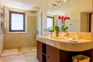 a bathroom with a large sink and a shower at Finca Son Pol in Andratx +16 photos