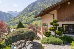 a house with a view of a mountain at La Tour 74 in Thônes