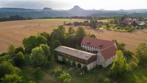 an aerial view of a large building in a field at Fewo Hohe Liebe in Rathmannsdorf