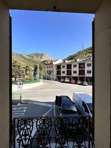 a view of a parking lot from a balcony at Appartamento Bardonecchia in Bardonecchia