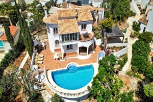 an aerial view of a house with a swimming pool at Casa Crystal in Jávea