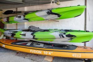 two kayaks are sitting on top of a surfboard at Ferienhaus Ton Sünhus in Groß Labenz