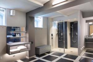 a bathroom with a shower and a sink at Kurhaus Masserberg in Masserberg +136 photos