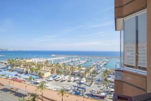 a view of a marina from a building at Stunning Marina view apartment in Fuengirola