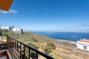 a view of the ocean from a balcony at Casa Maruca 1 in Valverde