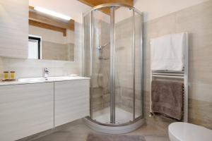 a bathroom with a shower and a sink at Borgo Vico in Verceia +24 photos