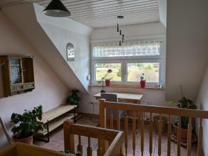 a dining room with a table and a window at Ferienwohnung Dorfprozelten in Dorfprozelten