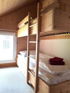a bunk bed room with two bunk beds in a cabin at Chalet Martina in Stadl an der Mur