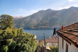a view of a body of water and mountains at Casa Armando in Laglio