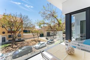 a living room with a view of a parking lot at Apartamento Novasol in Fuengirola