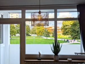 a window with a view of a park at Ferienwohnung Nautilus in Heiligenhafen