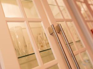 a sliding glass door with a glass window at Ferienwohnung Knopf in Schömberg +36 photos