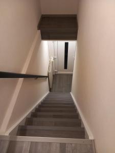 a staircase leading up to the top of a building at Ferienwohnung Conrads in Zetel +2 photos